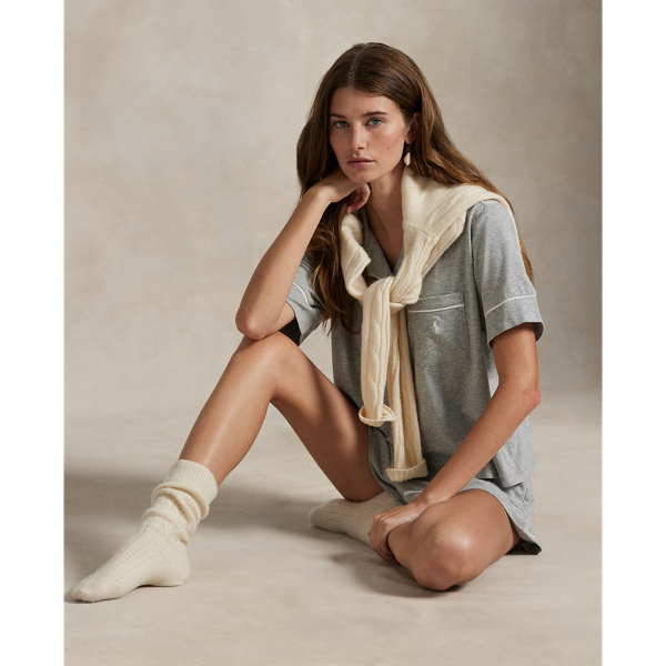 Pairing a short-sleeve shirt with elasticated shorts, this pyjama set is designed with classic piping and embroidered with our iconic Pony. Crafted for year-round versatility and comfort, its stretch cotton-blend fabric was selected for its breathability and soft hand feel, which will only increase with time.