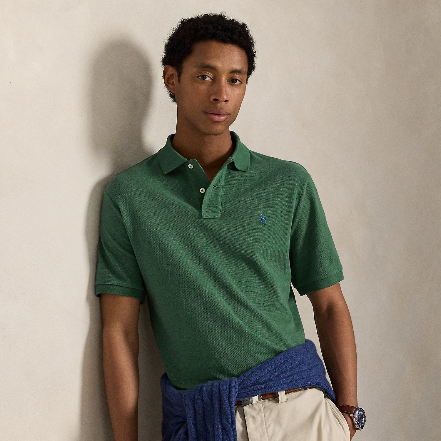An American style standard since 1972, the Polo shirt has been imitated but never matched. Over the decades, Ralph Lauren Lauren has re-imagined his signature style in a wide array of colours and fits, yet all retain the quality and attention to detail of the iconic original. This Classic Fit version is made from our highly breathable cotton mesh, which offers a textured look and a soft feel.
