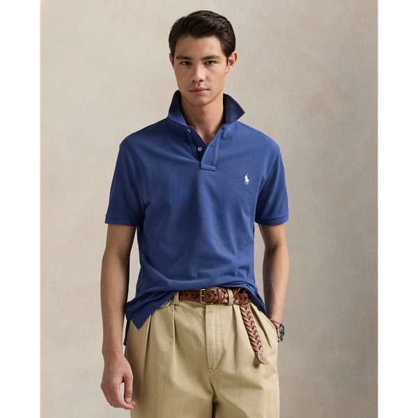 An American style standard since 1972, the Polo shirt has been imitated but never matched. Over the decades, Ralph Lauren Lauren has re-imagined his signature style in a wide array of colours and fits, yet all retain the quality and attention to detail of the iconic original. This Classic Fit version is made from our highly breathable cotton mesh, which offers a textured look and a soft feel.