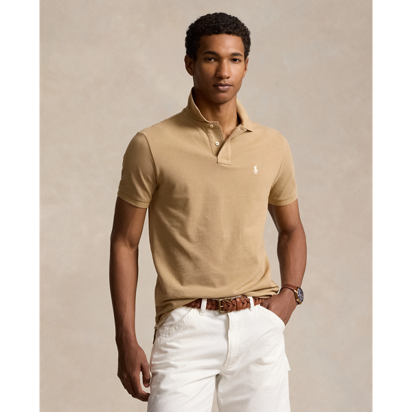 An American style standard since 1972, the Polo shirt has been imitated but never matched. Over the decades, Ralph Lauren Lauren has re-imagined his signature style in a wide array of colours and fits, yet all retain the quality and attention to detail of the iconic original. This version is made from our highly breathable cotton mesh, which offers a textured look and a soft feel.