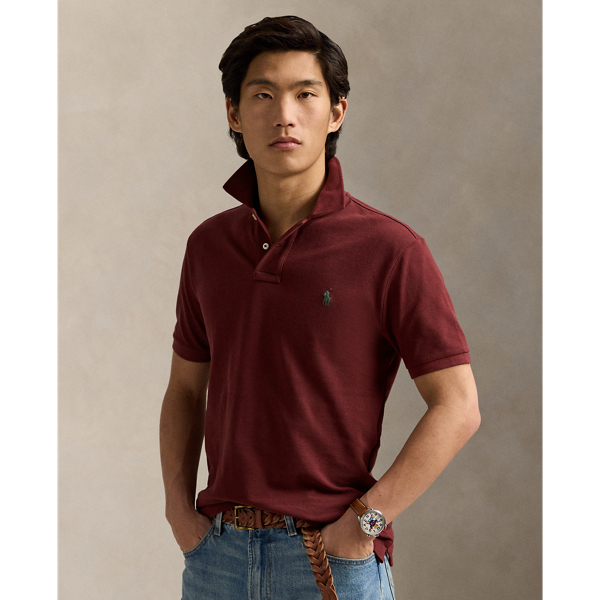 An American style standard since 1972, the Polo shirt has been imitated but never matched. Over the decades, Ralph Lauren Lauren has re-imagined his signature style in a wide array of colours and fits, yet all retain the quality and attention to detail of the iconic original. This version is made from our highly breathable cotton mesh, which offers a textured look and a soft feel.