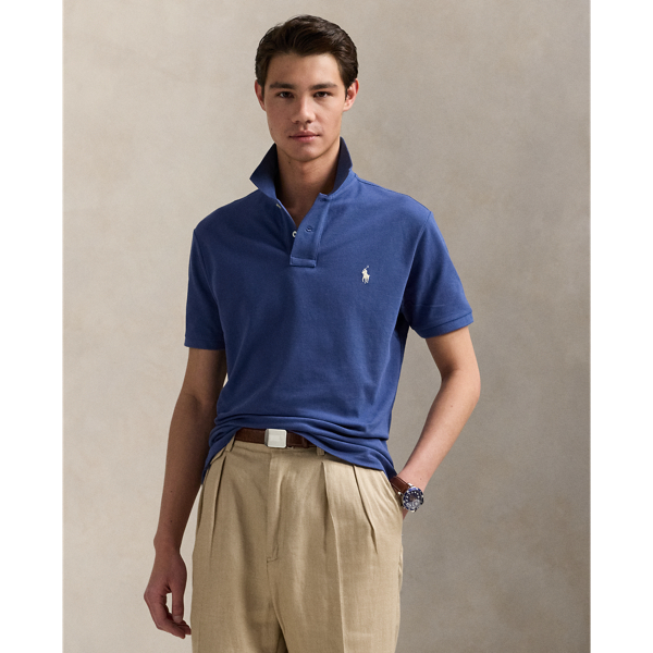 An American style standard since 1972, the Polo shirt has been imitated but never matched. Over the decades,  Ralph Lauren Lauren has re-imagined his signature style in a wide array of colours and fits, yet all retain the quality and attention to detail of the iconic original. This version is made from our highly breathable cotton mesh, which offers a textured look and a soft feel.