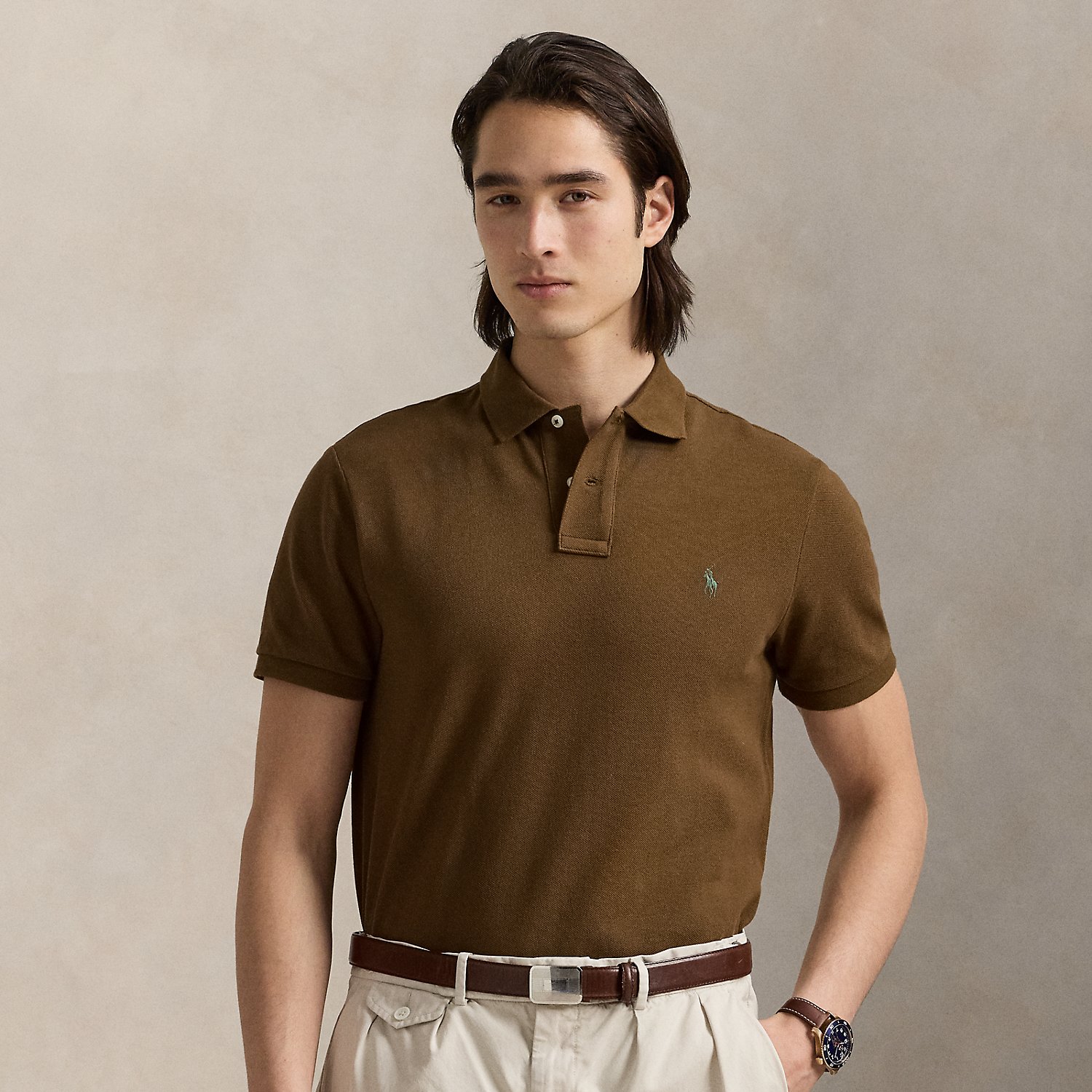 An American style standard since 1972, the Polo shirt has been imitated but never matched. Over the decades, Ralph Lauren Lauren has re-imagined his signature style in a wide array of colours and fits, yet all retain the quality and attention to detail of the iconic original. This version is made from our highly breathable cotton mesh, which offers a textured look and a soft feel.
