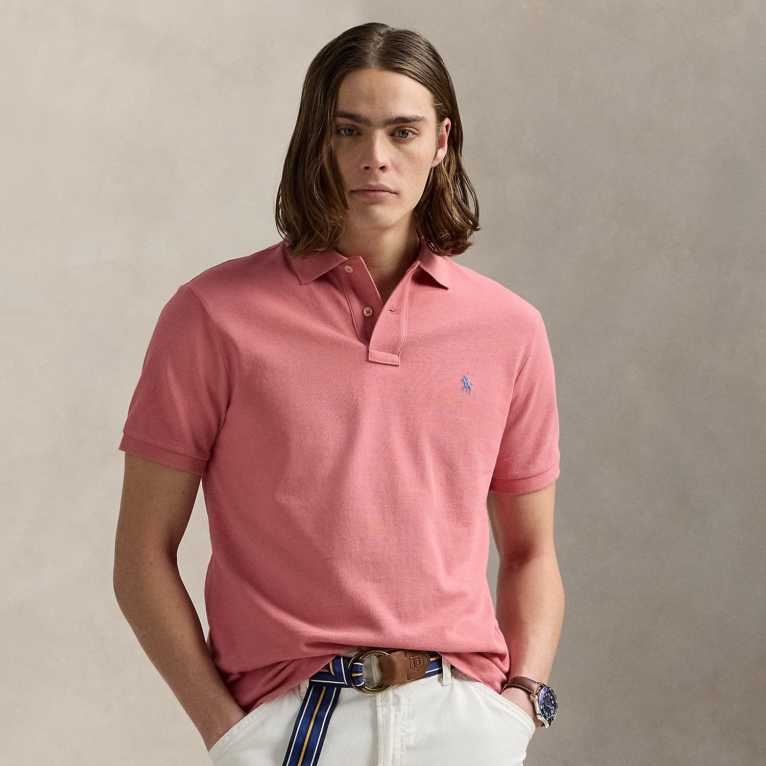 An American style standard since 1972, the Polo shirt has been imitated but never matched. Over the decades, Ralph Lauren Lauren has re-imagined his signature style in a wide array of colours and fits, yet all retain the quality and attention to detail of the iconic original. This version is made from our highly breathable cotton mesh, which offers a textured look and a soft feel.
