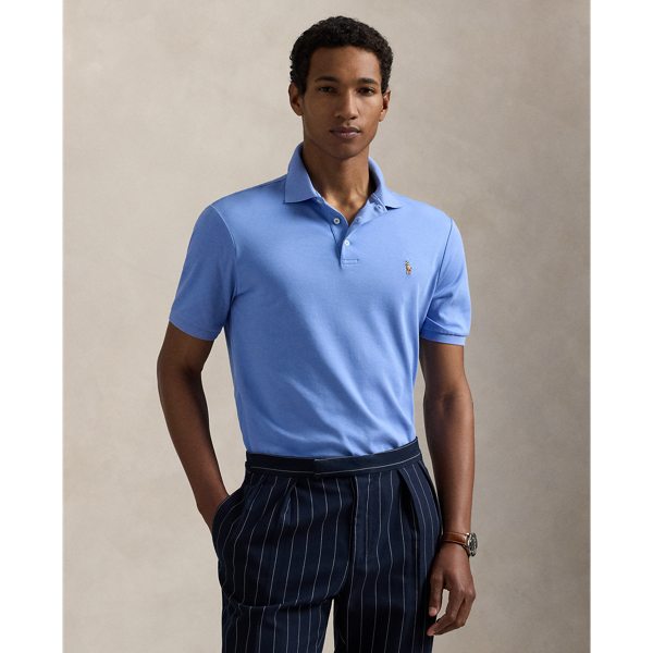 An American style standard since 1972, the Polo shirt has been imitated but never matched. Over the decades,  Ralph Lauren Lauren has re-imagined his signature style in a wide array of colours and fits, yet all retain the quality and attention to detail of the iconic original. This trim version is made from luxe cotton interlock, which features an ultra-soft finish.