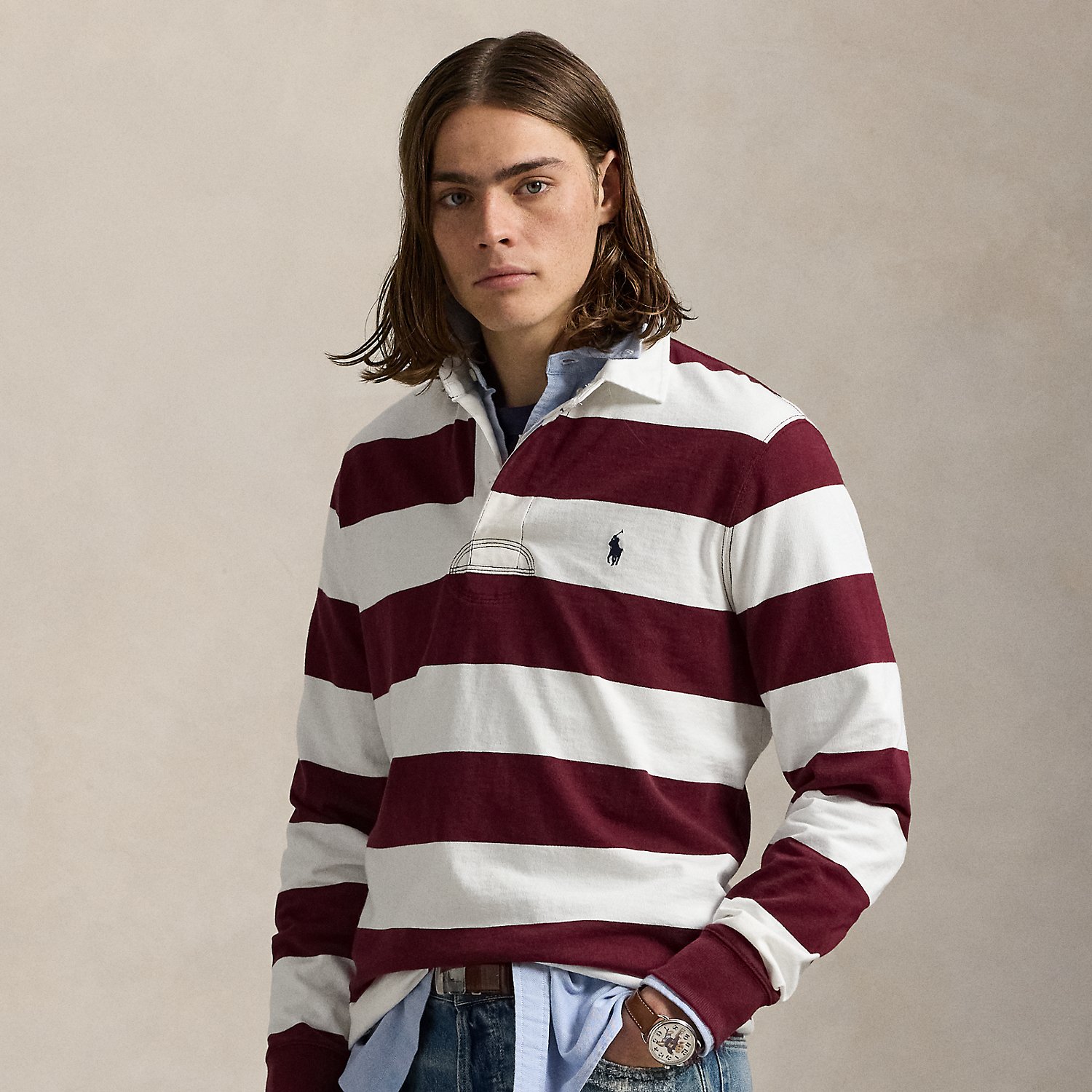 With its athletic details and timeless design, the Iconic Rugby Shirt captures the preppy yet sporty sensibility that has long defined the Polo Ralph Lauren Lauren brand. This version features all the hallmarks of a traditional rugby shirt – the distinctive stripe, white point collar, concealed placket, rubber buttons and rib-knit cuffs. Made from durable cotton jersey, which stays true to the sport's rough-and-tumble heritage, this shirt will stand up to repeated wear on and off the pitch.