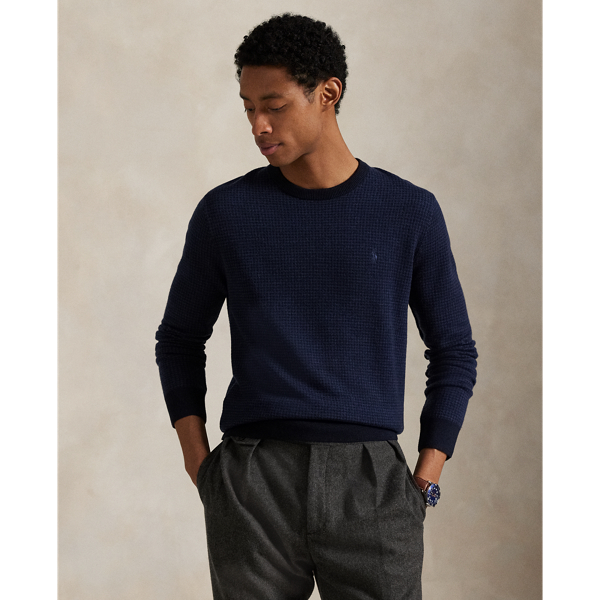 This jumper's wool yarn is treated for easy care and worsted for durability as well as a fine, smooth texture. It features our signature embroidered Pony on the left chest.