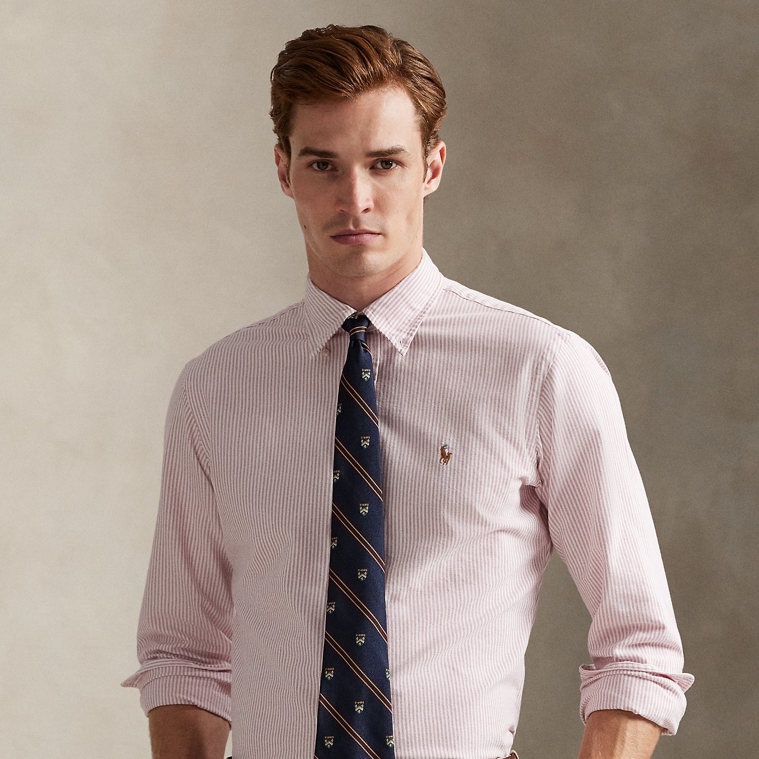 The oxford shirt made its debut very early in Ralph Lauren Lauren’s designs, and since then, it has solidified its status as a pillar of the Polo look. Today, Mr Lauren continues to create countless variations of his iconic shirt, including this striped version, which is embroidered with our multicoloured signature Pony.