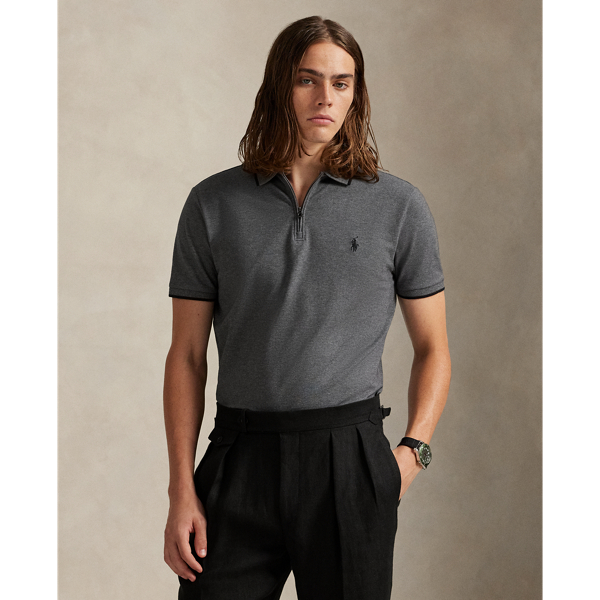 An American style standard since 1972, the Polo shirt has been imitated but never matched. Over the decades, Ralph Lauren Lauren has reimagined his signature style in a wide array of colours and fits, yet all retain the quality and attention to detail of the iconic original. This textured version includes a hint of stretch, allowing for unparalleled ease of movement and comfort.