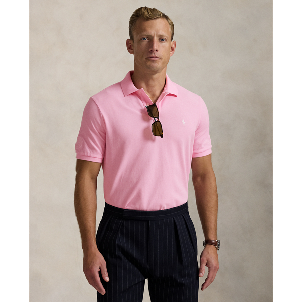 Part of our collection celebrating Wimbledon 2025, this unisex cotton Polo shirt is embroidered with our signature Pony and the official "The Championships Wimbledon" logo. It is dyed and washed to achieve distinct tonal nuances that provide a unique character to the cloth.