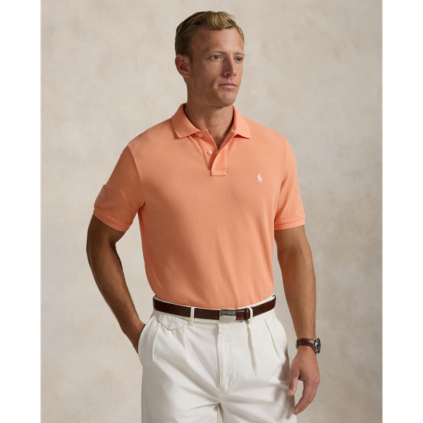 Part of our collection celebrating Wimbledon 2025, this unisex cotton Polo shirt is embroidered with our signature Pony and the official "The Championships Wimbledon" logo. It is dyed and washed to achieve distinct tonal nuances that provide a unique character to the cloth.