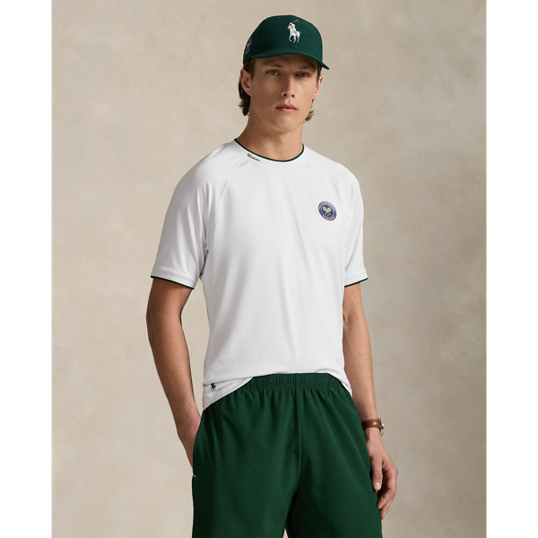 Part of our collection celebrating Wimbledon 2025, this unisex T-shirt features the tournament's official logo patch and our signature Pony. Its jacquard mesh fabric is developed with moisture-wicking properties to help keep you cool and comfortable.