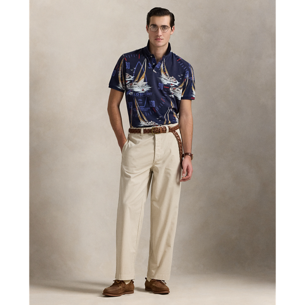 An American style standard since 1972, the Polo shirt has been imitated but never matched. Over the decades, Ralph Lauren Lauren has reimagined his signature style in a wide array of colours and fits, yet all retain the quality and attention to detail of the iconic original. This nautical-inspired version features a Polo Sport print from the '80s. It is specially washed for a sun-faded, vintage effect and finished with "Polo" embroidery.