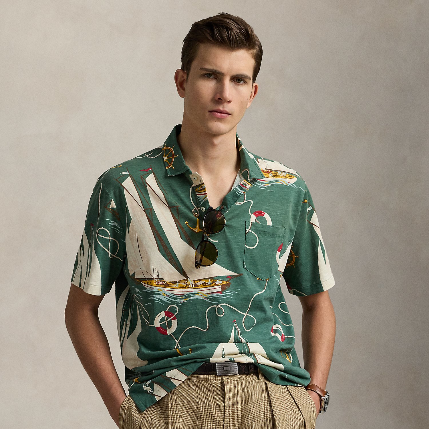 An American style standard since 1972, the Polo shirt has been imitated but never matched. Over the decades, Ralph Lauren Lauren has re-imagined his signature style in a wide array of colours and fits, yet all retain the quality and attention to detail of the iconic original. In gauzy cotton jersey, this version features an archival Ralph Lauren Lauren print from the early noughties: a sailboat motif inspired by mid-20th-century home furnishing patterns.