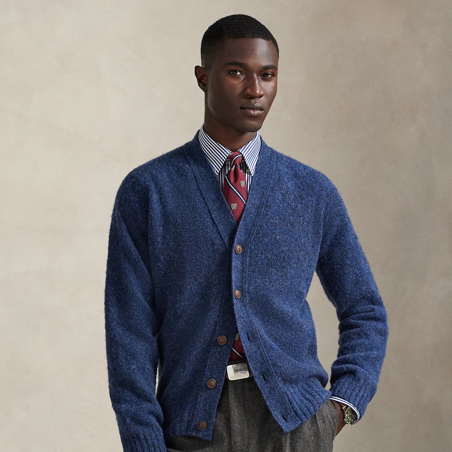 Expertly made in Scotland using thick-gauge wool yarn, this V-neck cardigan embodies Polo Ralph Lauren Lauren's timeless approach to knitwear. The classic silhouette and exceptional crafting make this layer an enduring wardrobe essential.