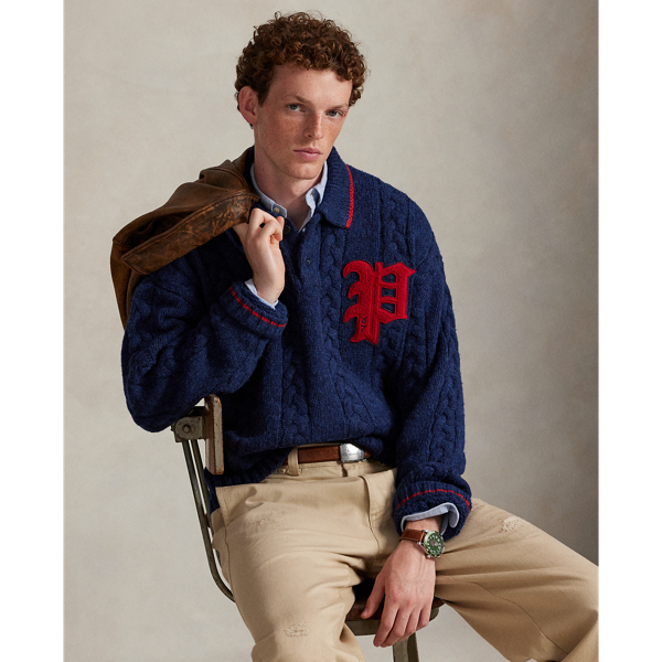 This cable-knit jumper features a chenille letter patch embroidered with "67", which nods to our founding year. Its braided-cable motif is rendered with thick-gauge yarn that is spun with wool, cotton, alpaca wool and linen.