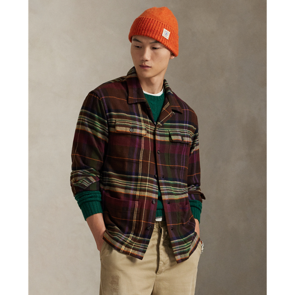 Inspired by an après-ski shirt, this layer is crafted with plaid cotton flannel that is brushed for an extra-soft and cosy feel. It is intricately embroidered at one of the pockets with a "Polo RL" logo that includes our signature Pony.