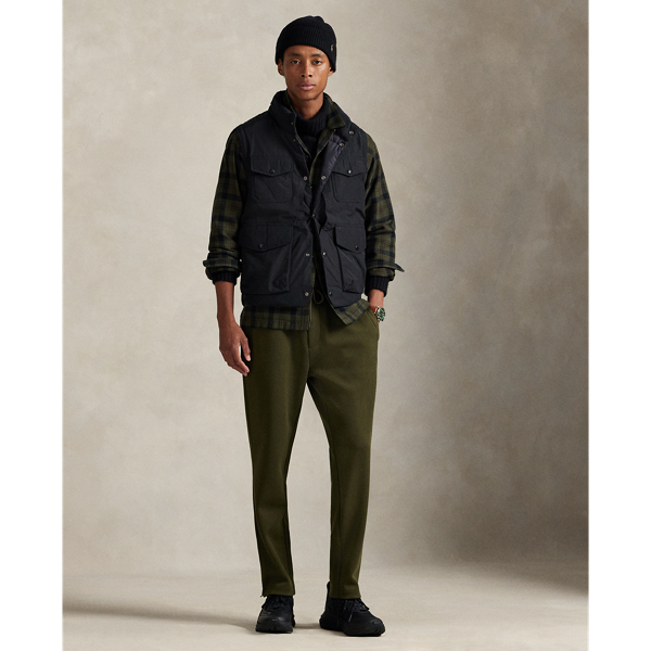 These lightweight track trousers are crafted from a smooth double-knit fabric that features a mesh underside. Tonal stripes and zipped vented hems further their sporty appeal.