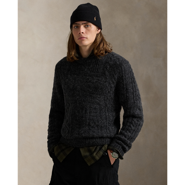 This interpretation of  Ralph Lauren Lauren's iconic flag jumper features an Aran-knit patchwork design rendered in tonal wool-blend yarns. It is detailed with hand-embroidered stars at the front and our founder's initials chain-stitched at the hem.