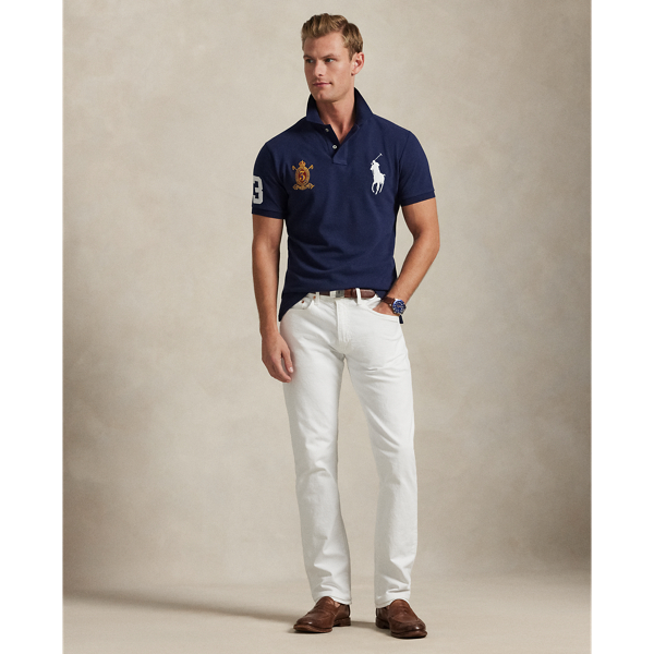 An American style standard since 1972, the Polo shirt has been imitated but never matched. Over the decades, Ralph Lauren Lauren has reimagined his signature style in a wide array of colours and fits, yet all retain the quality and attention to detail of the iconic original. This version features our Big Pony, a crest and a "3" patch – nodding to the number typically worn by a polo team's strongest player.