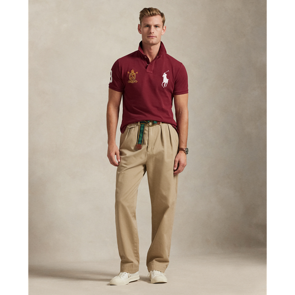 An American style standard since 1972, the Polo shirt has been imitated but never matched. Over the decades, Ralph Lauren Lauren has reimagined his signature style in a wide array of colours and fits, yet all retain the quality and attention to detail of the iconic original. This version features our Big Pony, a crest and a "3" patch – nodding to the number typically worn by a polo team's strongest player.