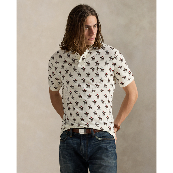 An American style standard since 1972, the Polo shirt has been imitated but never matched. Over the decades,  Ralph Lauren Lauren has re-imagined his signature style in a wide array of colours and fits, yet all retain the quality and attention to detail of the iconic original. This version is made with our highly breathable cotton mesh and printed with a polo player motif.