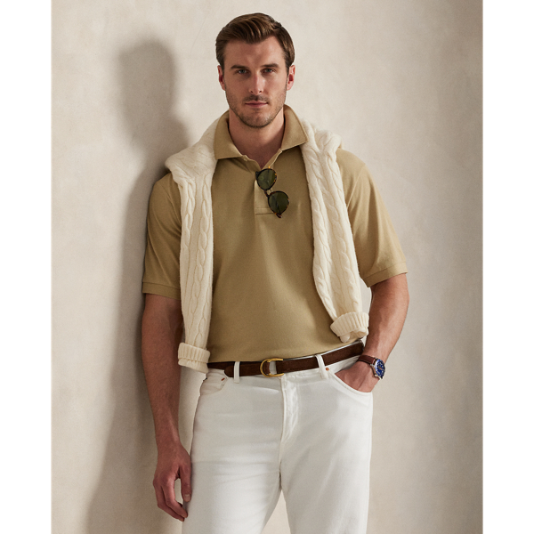 An American style standard since 1972, the Polo shirt has been imitated but never matched. Over the decades,  Ralph Lauren Lauren has reimagined his signature style in a wide array of colours and fits, yet all retain the quality and attention to detail of the iconic original. This Big & Tall version is made with our highly breathable cotton mesh, which offers a textured look and a soft feel.