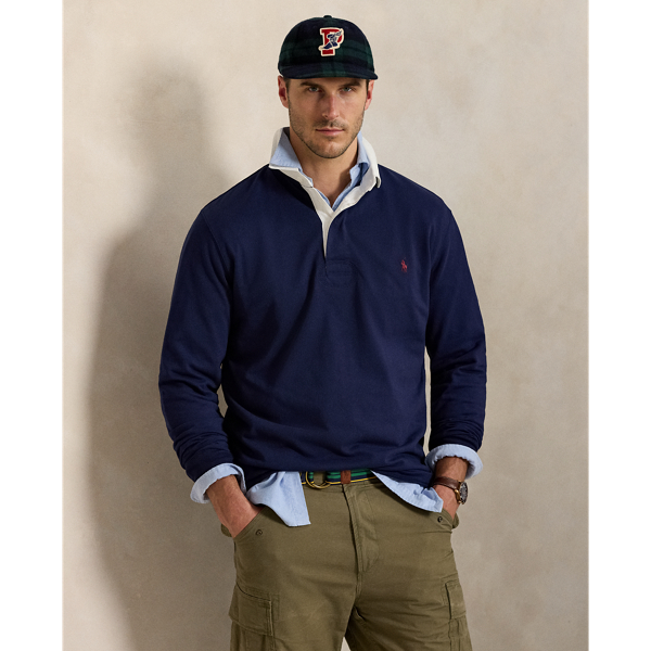 With its athletic details and timeless design, The Iconic Rugby Shirt captures the preppy yet sporty sensibility that has long defined the Polo  Ralph Lauren Lauren brand. This version features all the hallmarks of a traditional rugby shirt&mdash;the white point collar, a concealed placket, rubber buttons, and ribbed cuffs. Made from durable cotton jersey that stays true to the sport's rough-and-tumble heritage, this shirt will stand up to repeated wear on and off the field of play.
