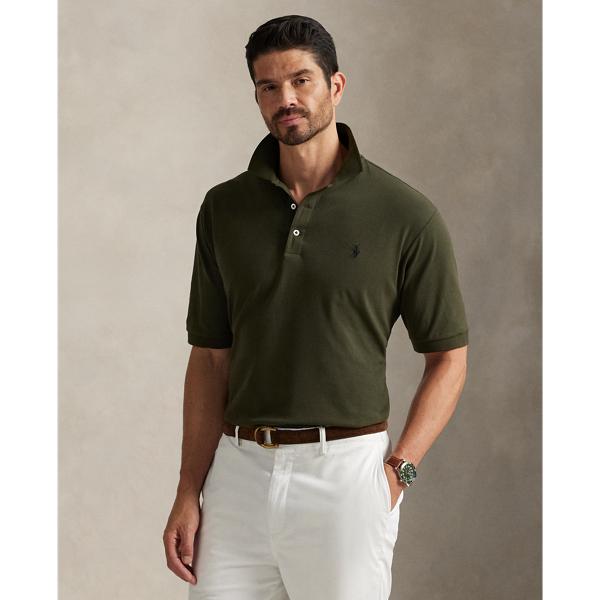 An American style standard since 1972, the Polo shirt has been imitated but never matched. Over the decades, Ralph Lauren Lauren has re-imagined his signature style in a wide array of colours and fits, yet all retain the quality and attention to detail of the iconic original. This Big & Tall version includes a hint of stretch, allowing for unparalleled ease of movement and comfort. It is finished with genuine mother-of-pearl buttons on the placket.