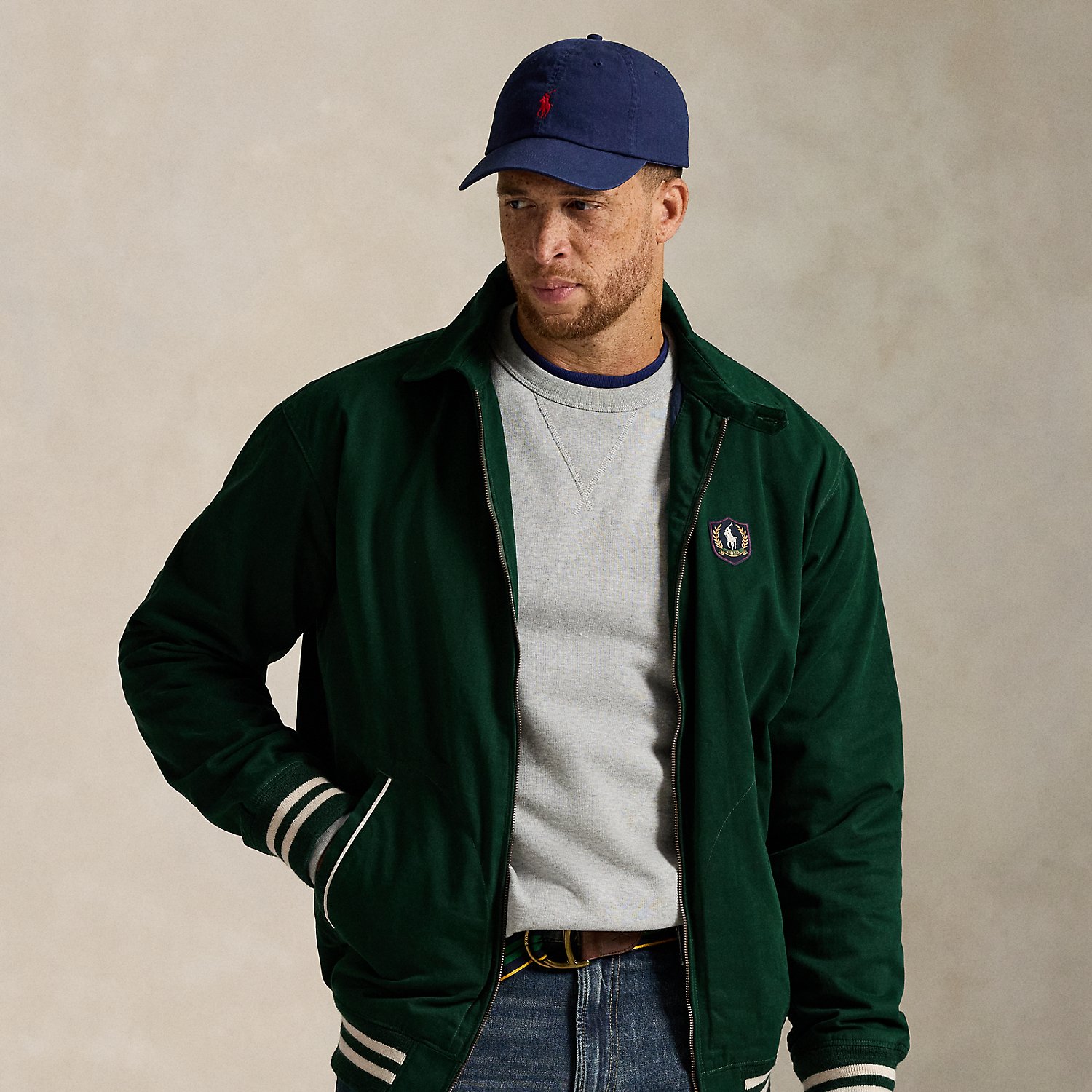 With its sporty silhouette and cotton twill construction, this Big & Tall jacket combines timeless athletic style with heritage craftsmanship. The vintage collegiate-inspired patch on the left chest features archival artwork along with the iconic Polo Pony.