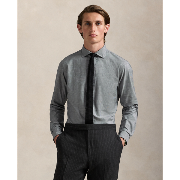 This shirt is crafted from 120s-quality, two-ply cotton twill offering a silky smooth finish. It features custom-developed genuine mother-of-pearl buttons and a tonal plaid pattern.