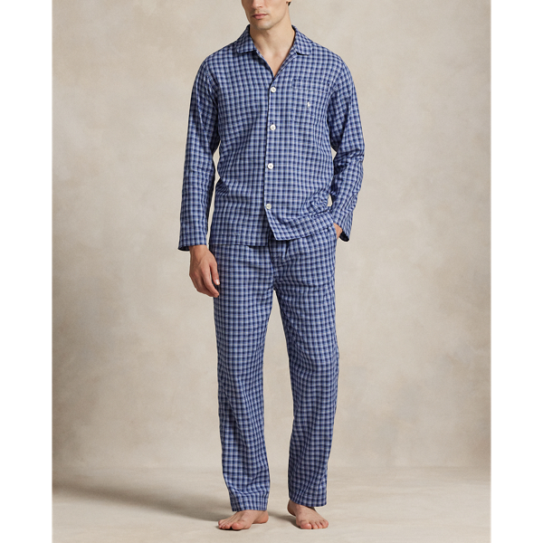 Crafted with lightweight woven cotton, the long-sleeve shirt and trousers in this pyjama set are printed all over with a monogram motif.