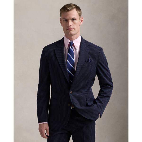 Our Polo suit jacket offers more structure in the chest and shoulders along with full lining. This striped version is crafted with a twill cloth that is custom-developed for natural wrinkle resistance and a smooth, shine-free finish. Added stretch provides extra comfort, making this lightweight layer perfect for all-season, everyday wear.