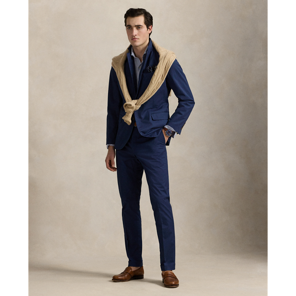 These suit trousers are crafted from custom-developed chino fabric, which is woven with extra stretch for added comfort. A special wash combined with a peached process imparts extraordinary softness along with a lightly broken-in appearance.