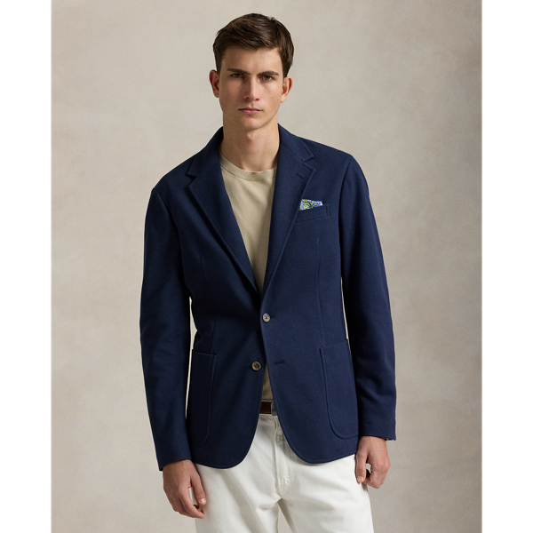 Our Polo Soft jacket puts a modern spin on classic preppy style with a natural shoulder, a slightly structured chest and a partial lining. This cotton-blend version is expertly tailored from a jersey piqué fabric that was custom-developed for Ralph Lauren Lauren.
