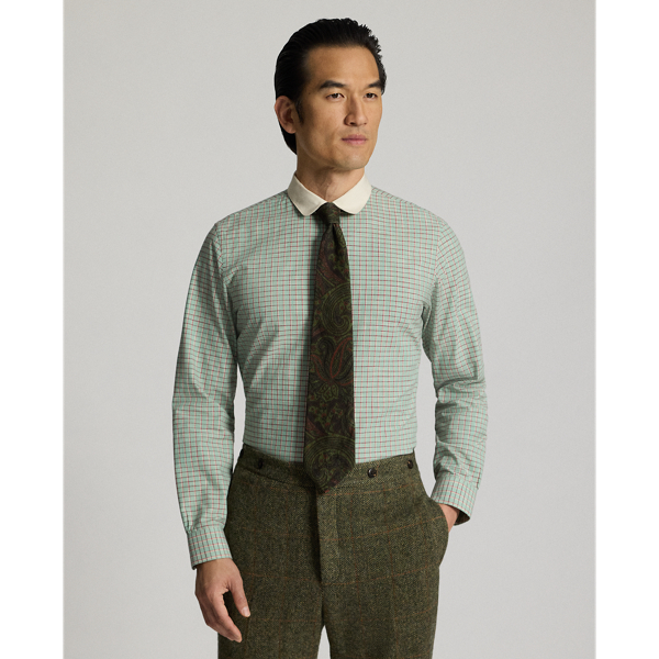 Slim-fitting shirt made from yarn-dyed cotton dobby inspired by an antique textile. Contrasting club collar. Genuine mother-of-pearl buttons.