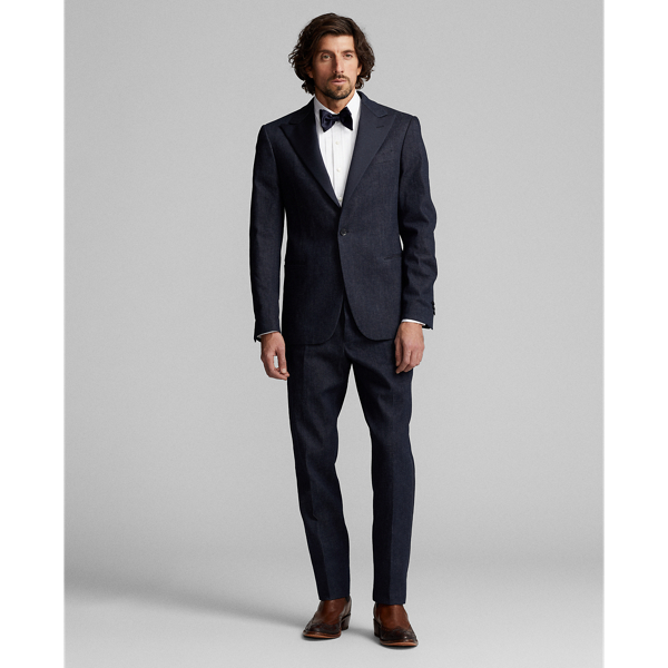 Slim-fitting trousers tailored in Italy. Custom-developed Japanese denim woven with a stretch cotton blend featuring linen and ramie. Dyed with indigo. Satin stripe on the outer side of each leg.