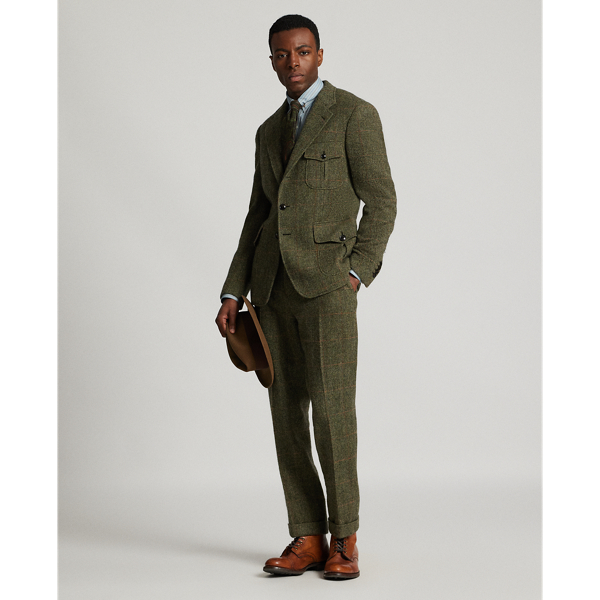 Slim-fitting trousers tailored in Italy. Wool herringbone cloth with a windowpane pattern. The cloth used in these trousers has been custom-developed with a storied Irish mill. half-lined. Genuine horn buttons.