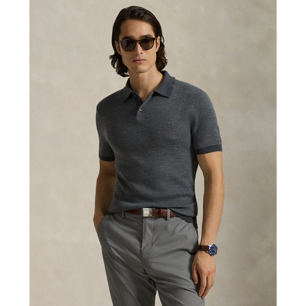 This jumper combines a silhouette inspired by our timeless Polo shirt with moisture-wicking COOLMAX fibres to help keep you cool, dry and comfortable. It is knit into a micro-checked pattern using a birdseye jacquard technique and finished with genuine mother-of-pearl buttons, which we have custom-developed with our logo.