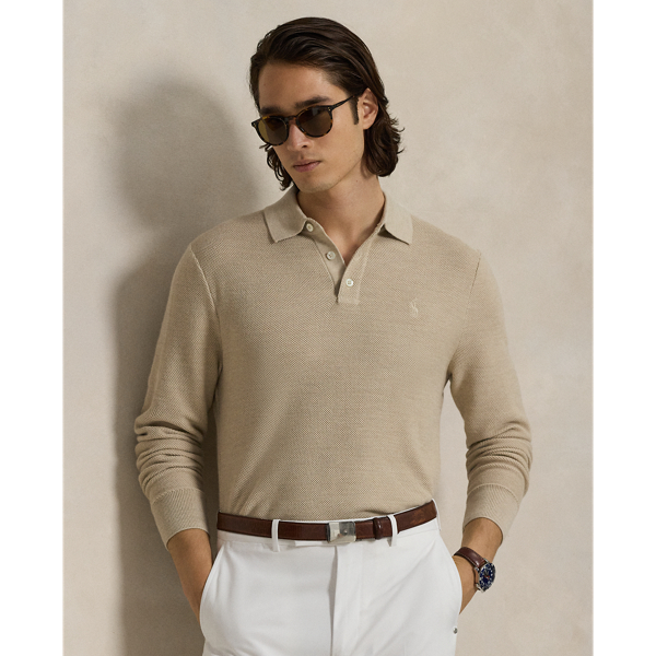 This jumper combines a silhouette inspired by our timeless Polo shirt with moisture-wicking COOLMAX fibres to help keep you cool, dry and comfortable. It is knit using a piqué stitch for subtle texture and finished with genuine mother-of-pearl buttons, which we have custom-developed with our logo.