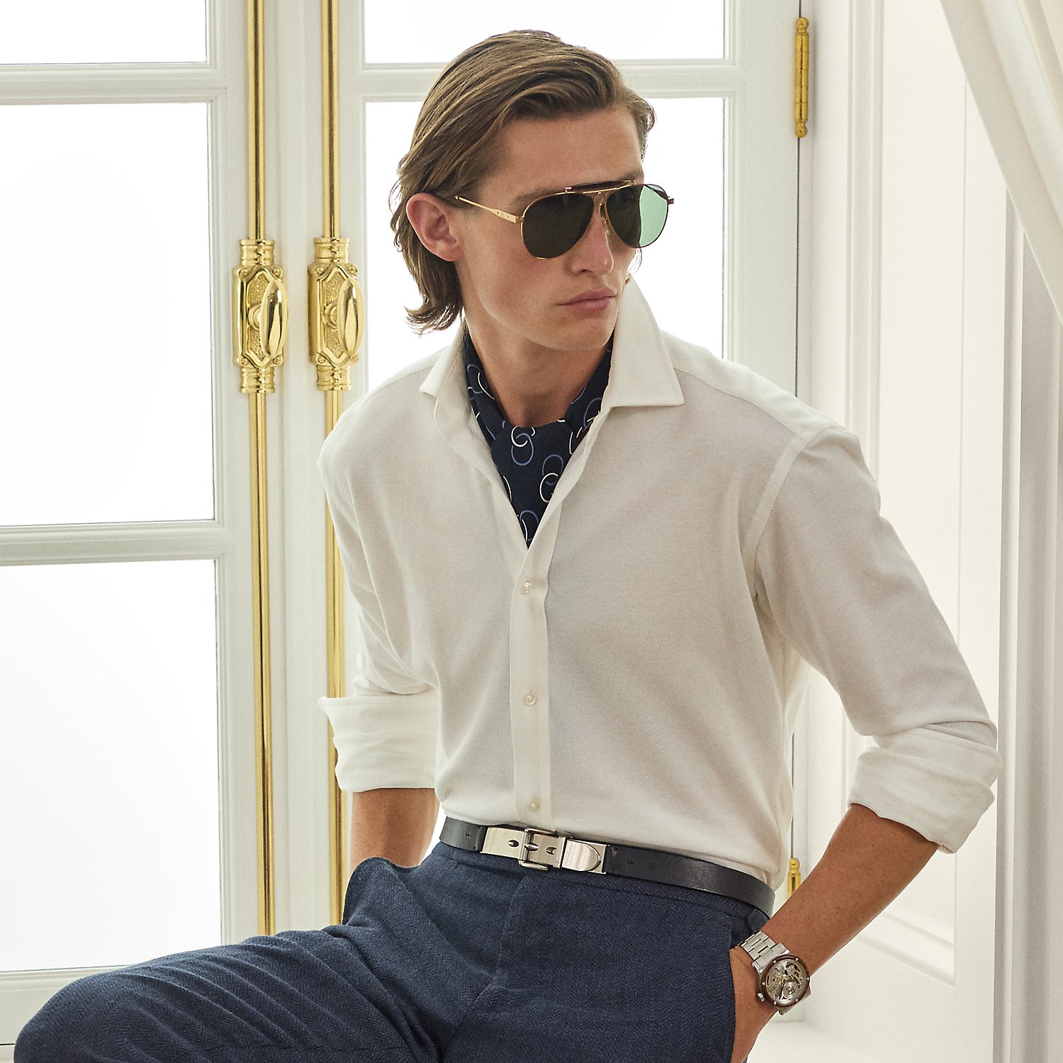 Inspired by two Ralph Lauren Lauren icons, this piece combines the refined silhouette of Purple Label's signature spread-collar shirt with the comfort and ease of our Polo shirt's cotton piqué fabric.