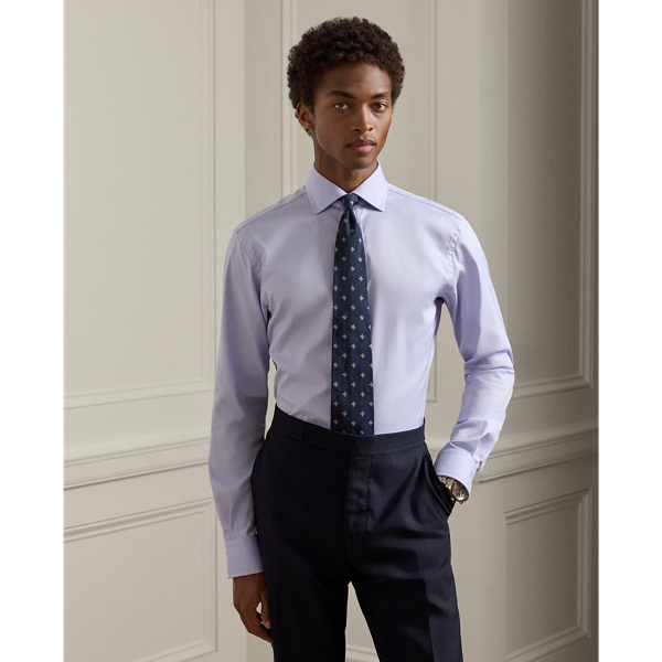 Crafted with premium cotton twill and enhanced with a crease-resistant treatment, this shirt represents the perfect fusion of modern innovation and timeless luxury. Each detail is thoughtfully considered, from the fabric's exceptional durability to the genuine mother-of-pearl buttons.