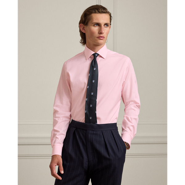 Meticulously crafted in Italy, this houndstooth shirt exemplifies sartorial excellence with its silky, super-fine cotton twill and genuine mother-of-pearl buttons. The precise compact weave of the cloth delivers superior colour brilliance, beautifully showcasing the bespoke hue, which was custom-developed with a storied Italian mill.